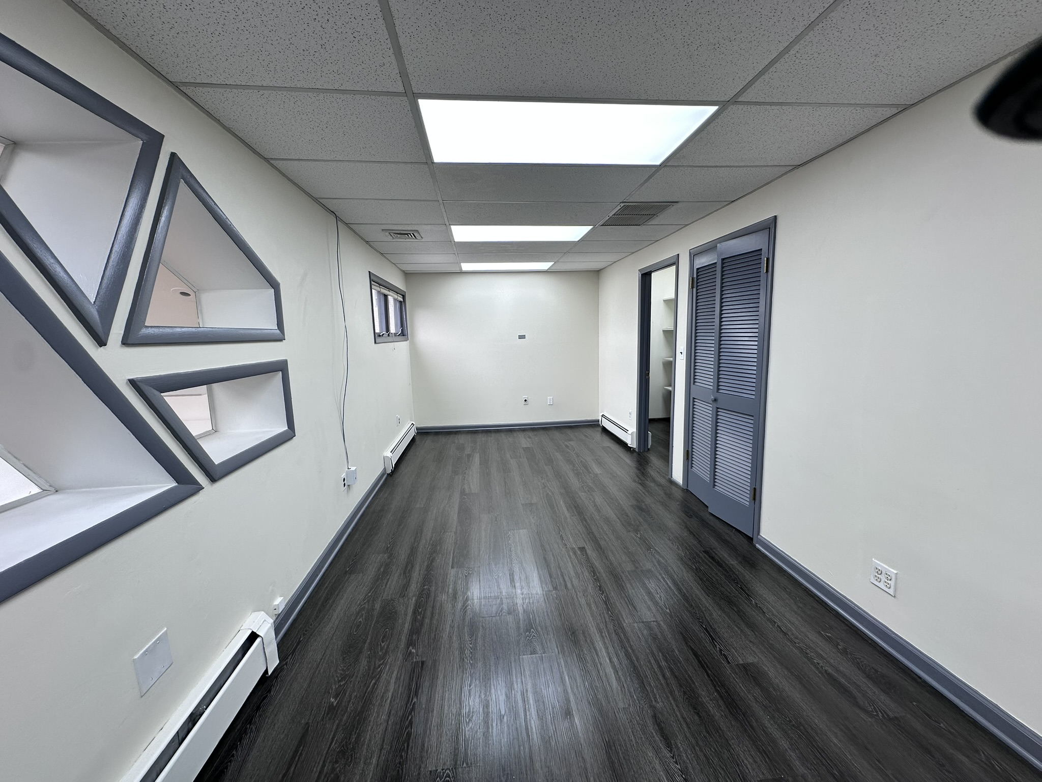 Suite 201 private office with dark flooring