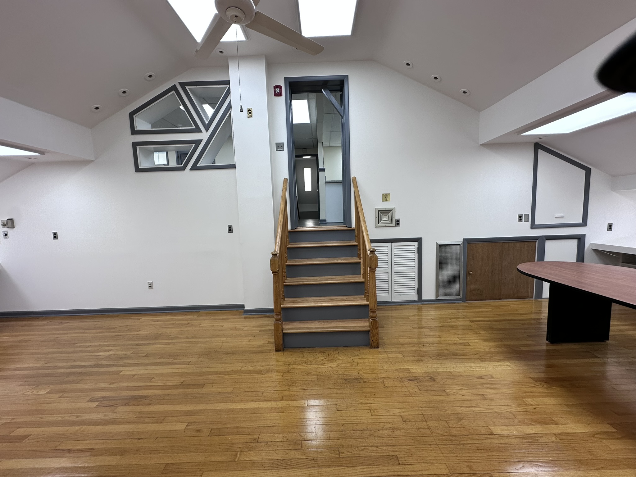Suite 201 stairs to loft-style office space