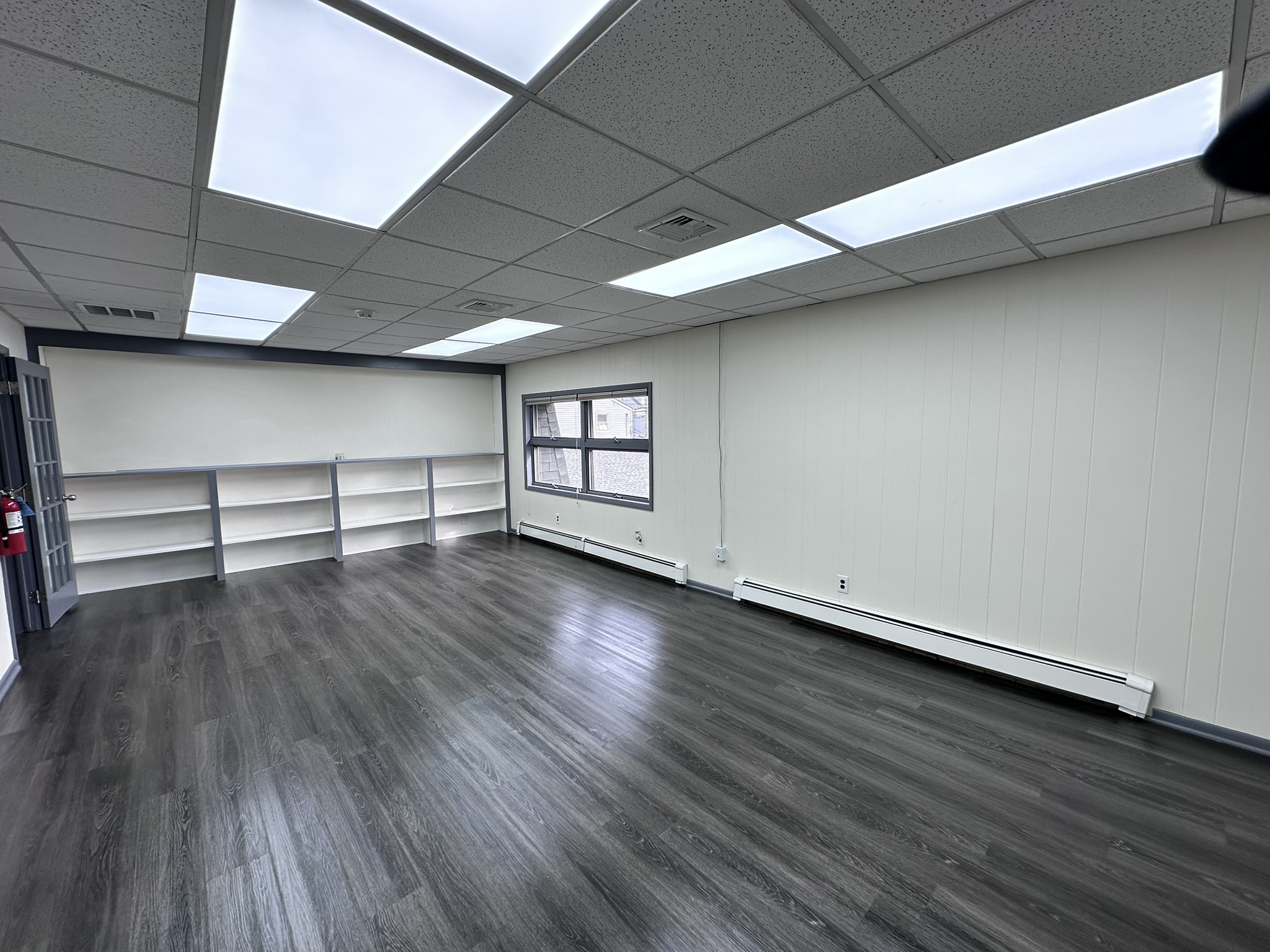Suite 202 office with built-in shelving