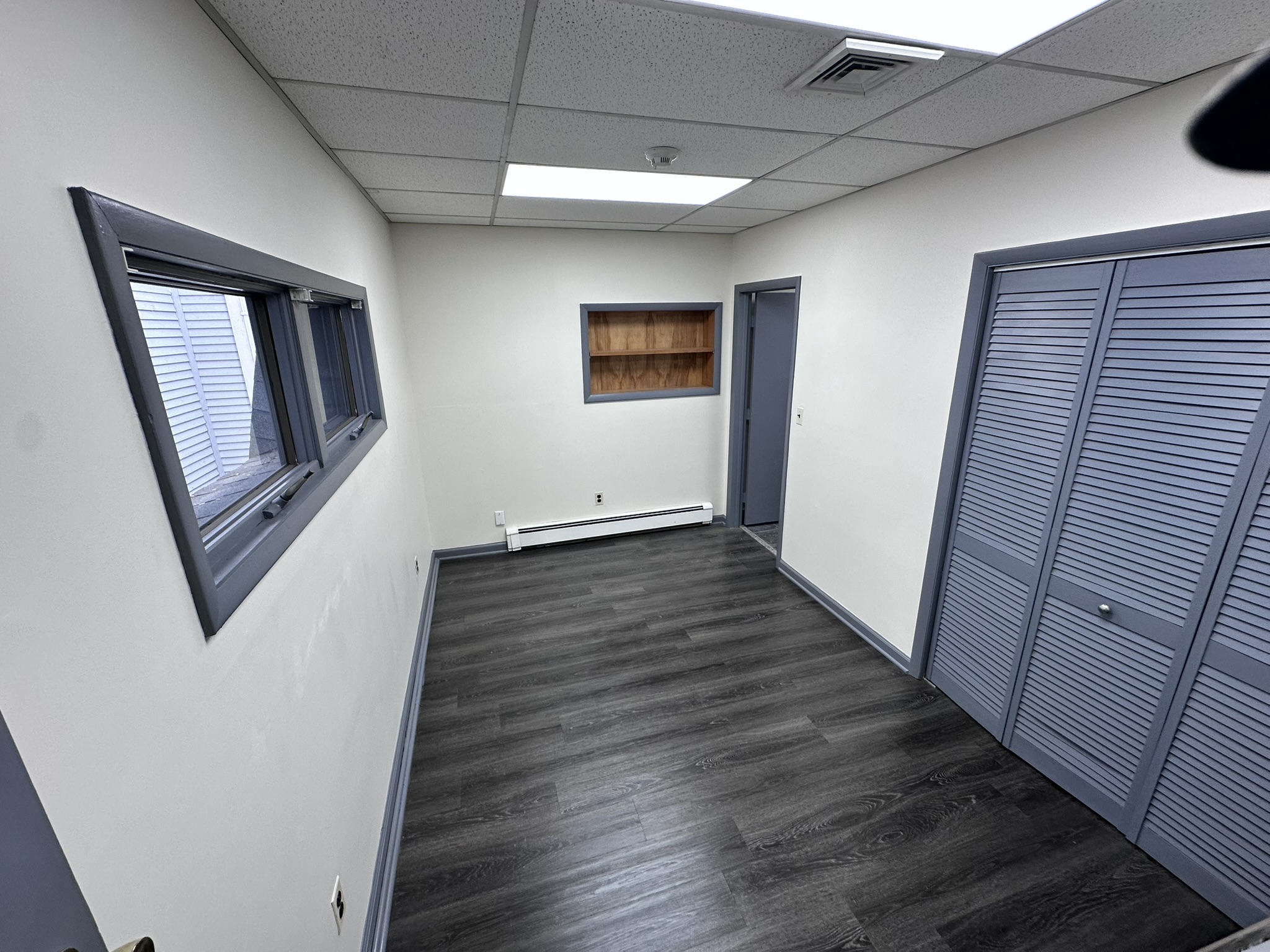 Suite 202 smaller office with closet doors